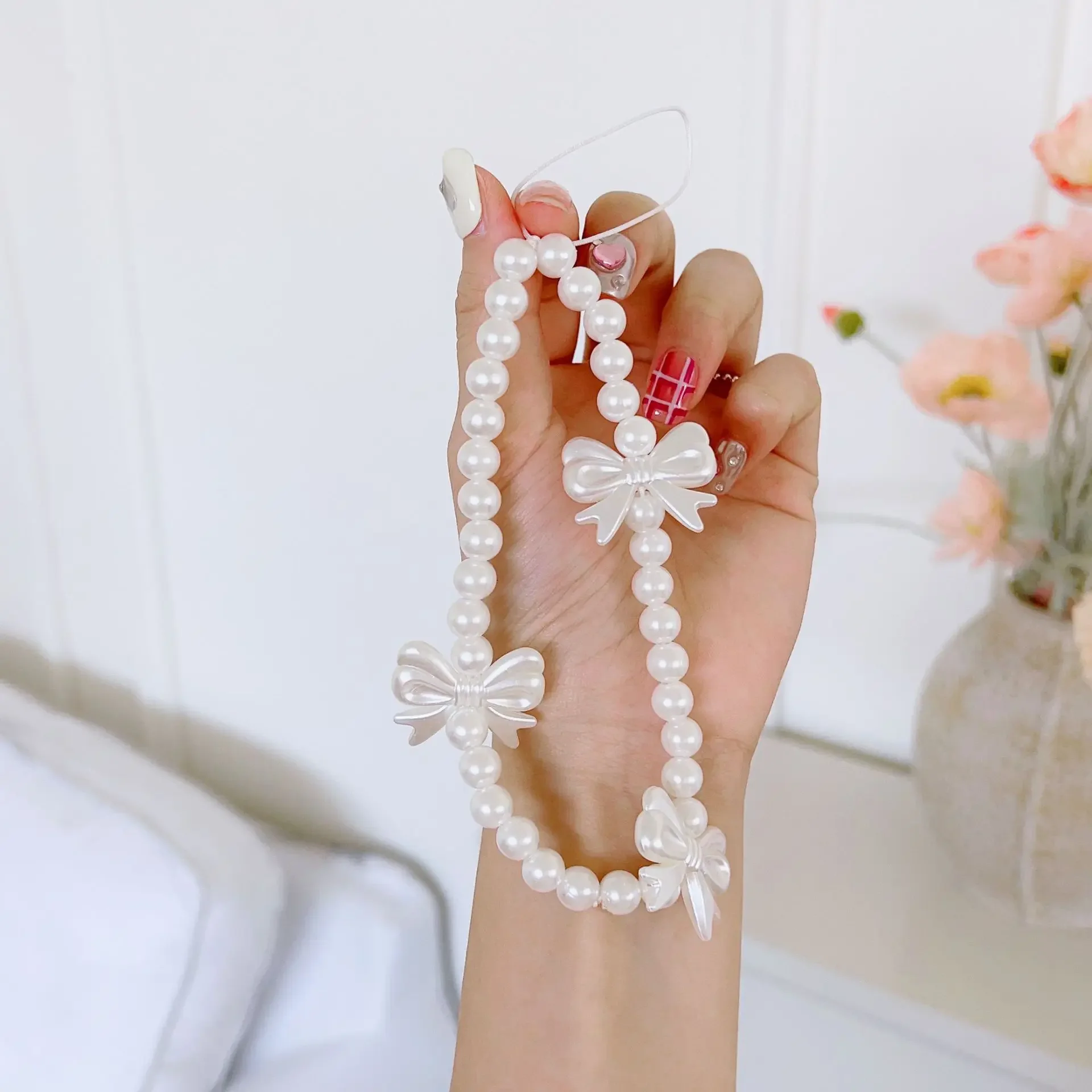 سلسلة هاتف لؤلؤية على شكل قلب مع فيونكة بيضاء من كوريا للنساء والفتيات حبل مطرز للهاتف إكسسوارات مضادة للفقدان هدية مجوهرات السيارة - 4