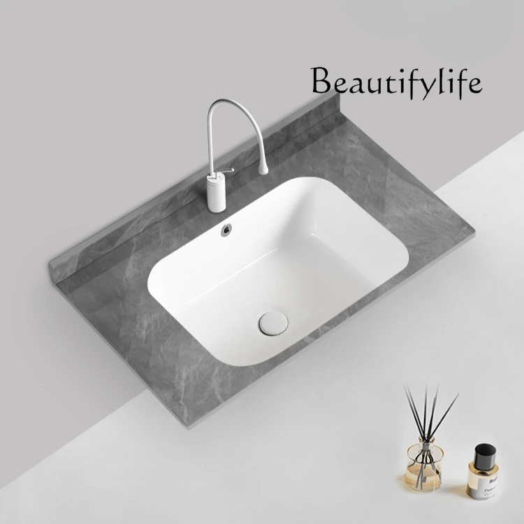 Rock slab countertop seamlessly deepens under-counter basin integrated basin ceramic laundry basin