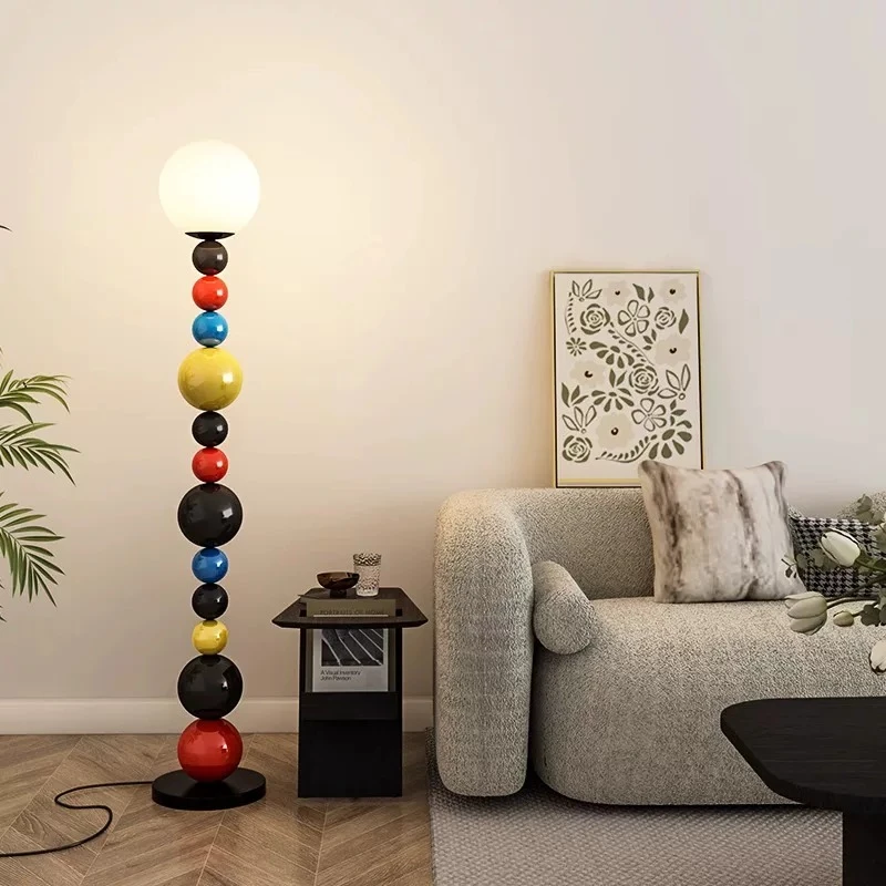 

Floor lamp with a unique ambiance, a creative Nordic bedroom designer macaron mood desk lamp beside the living room sofa