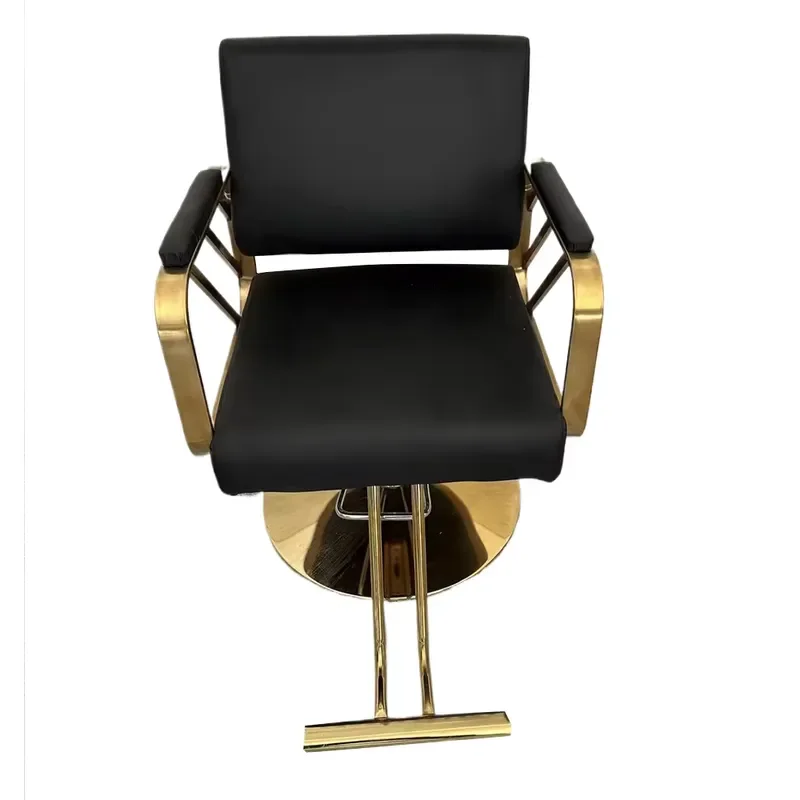 New golden steel barber chair with 360-degree rotation, ergonomic design, suitable for professional salons