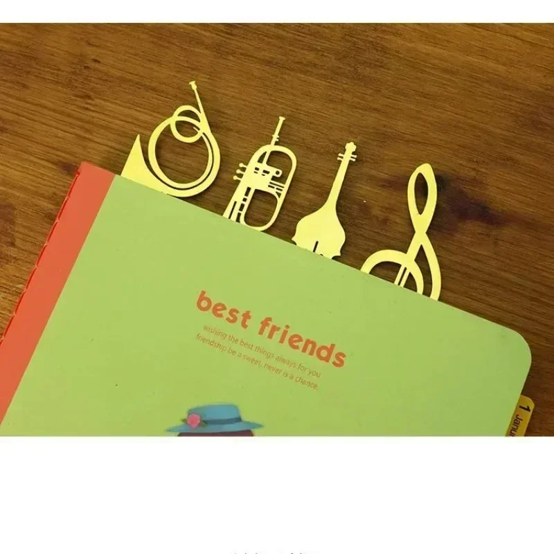 ชุดที่คั่นหนังสือเพลงโลหะสุดสร้างสรรค์อุปกรณ์การเรียนโอคาริน่าดอกไม้ฤดูหนาวสุดสวยอุปกรณ์ธุรกิจเปียโน