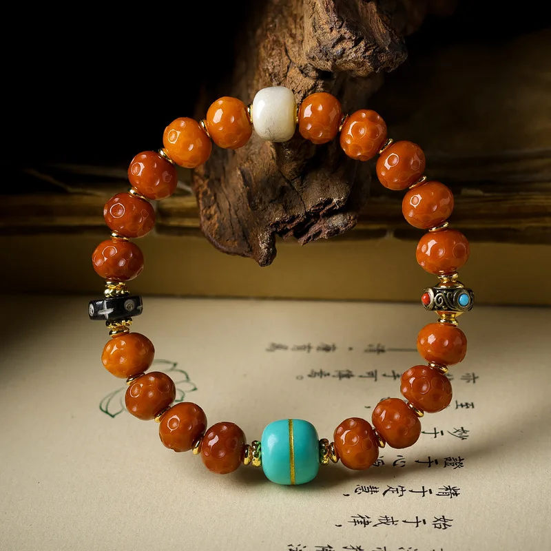 Original Tibetan-style bracelet featuring bone meteorite magnesite turquoise hamburger-shaped beads a traditional