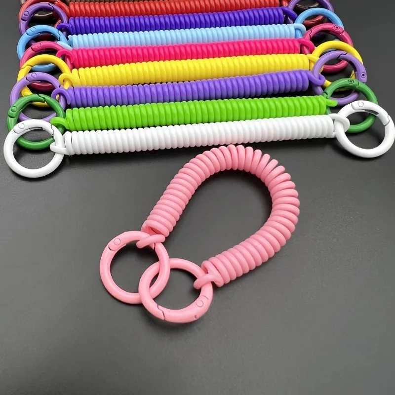 

1 piece of colored plastic spring rope keychain with double card slots, men's anti-lost phone lanyard, multiple colors of spiral retractable spring keychains