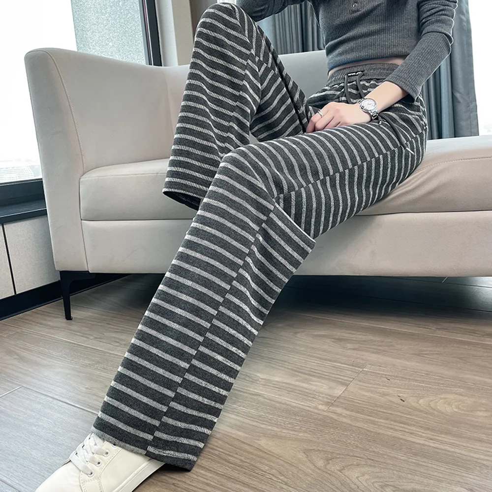 กางเกงขายาวผู้หญิงไซส์ใหญ่ ทรงหลวม สไตล์ลำลอง ลายทาง ขากว้าง ทรงตรง ใส่สบาย เหมาะกับฤดูใบไม้ผลิและฤดูใบไม้ร่วง ปี 2025