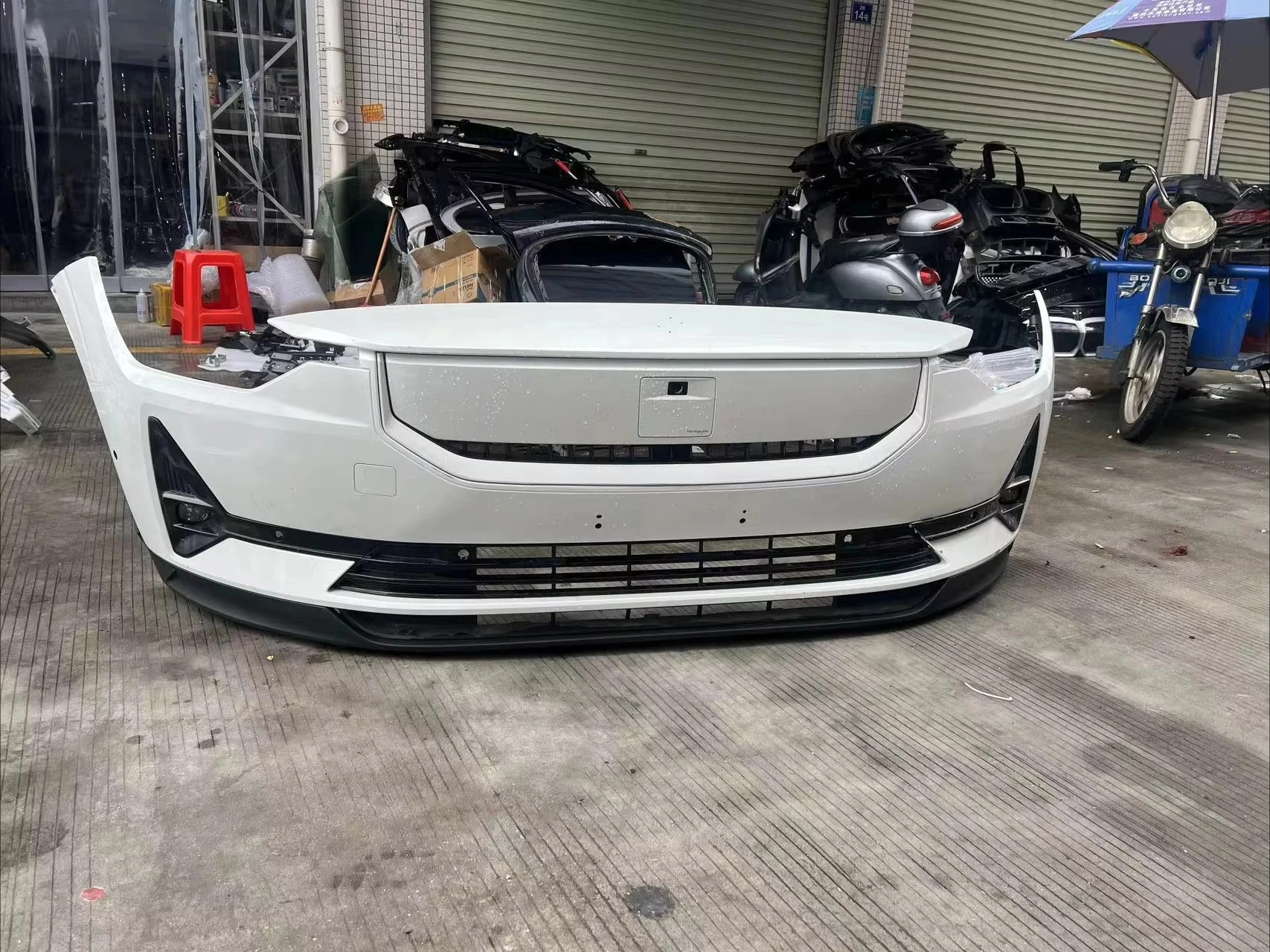 متوفر في المخزون مجموعة المصد الأمامي Polestar 2 عالية الجودة على الطراز الحديث أجزاء جسم السيارة الجديدة مع توصيل سريع مخصص