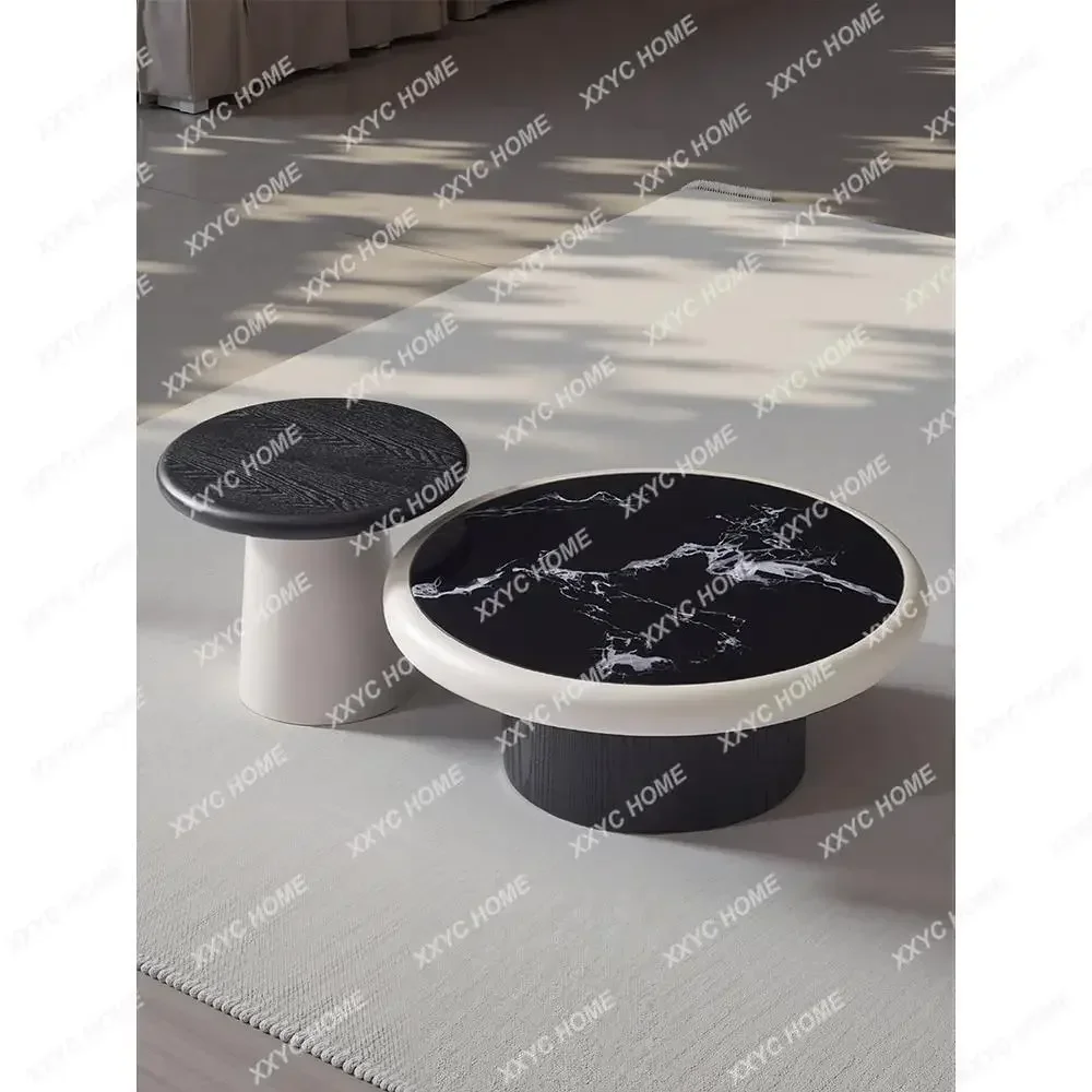 A Minimalist round coffee table living room modern light luxury microcrystalline stone coffee table combination