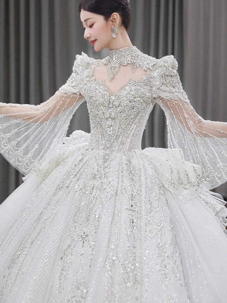 A new long-sleeved heavy-duty luxury haute couture dress with large tail view 3