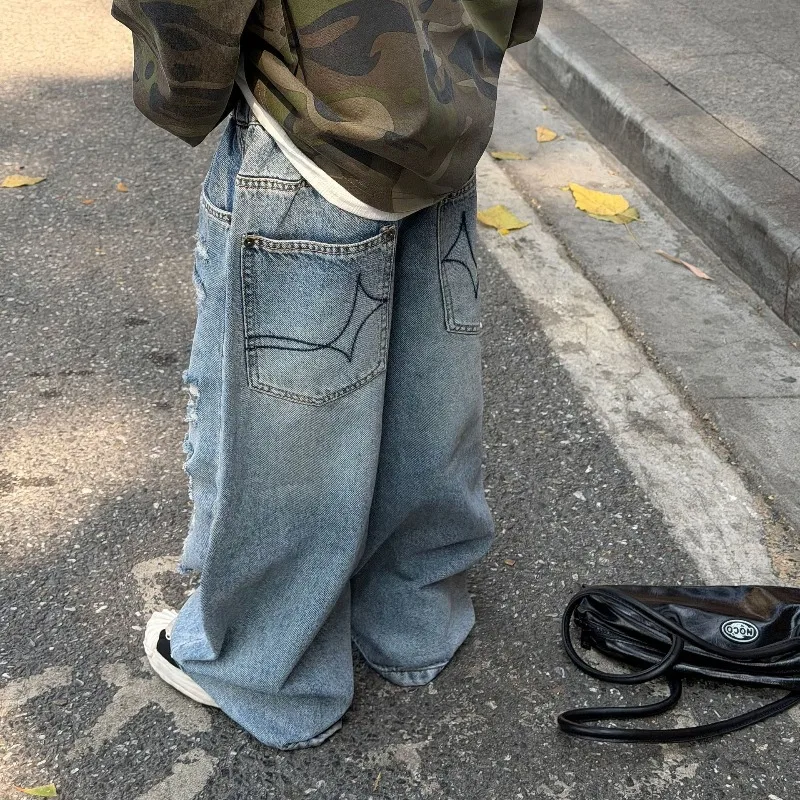 Boys Jeans Children's Design Sense Ripped Camouflage Pants Boys Personality Handsome Washed Denim Trousers 2026 Spring  New