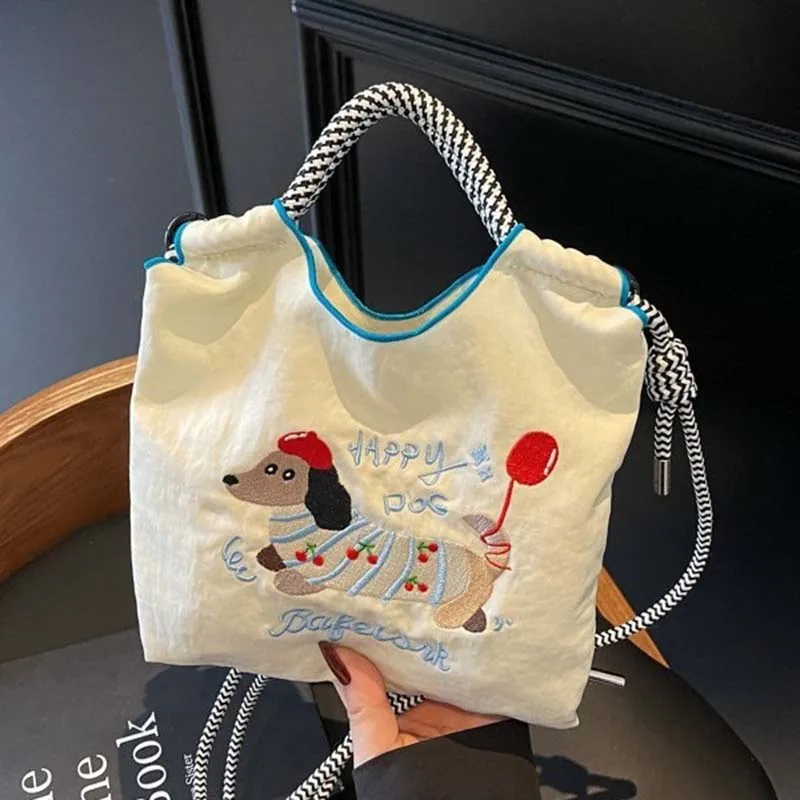 

2025 New Japanese Internet Celebrity Embroidery Handbag Bag Bag Women's Shopping Bag Cute Crossbody Bag Design Portable Shoulder
