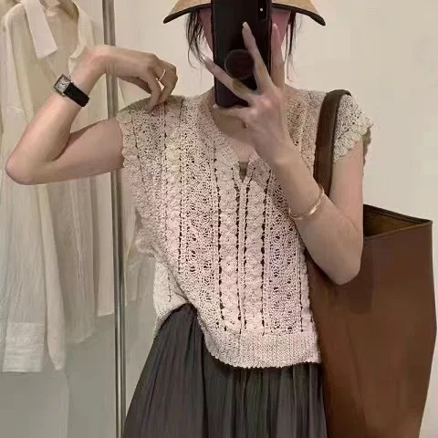 Moda coreana scava fuori maglia gilet camicia scollo a V senza maniche gancio fiore camicetta dolce tinta unita top da donna