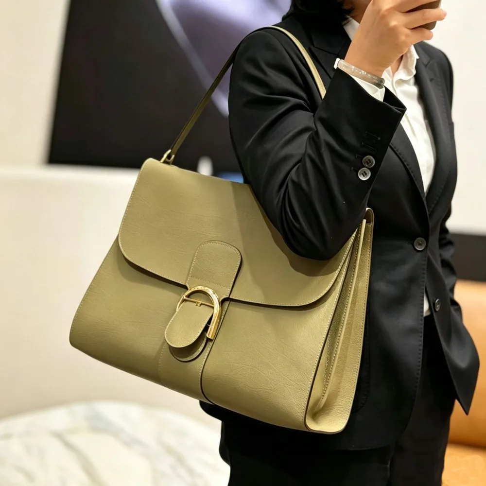 

Handbag Cowhide Lock Saddle Bag Premium Handbag Women's Texture Unique Fashion Niche Commuter One Shoulder Oblique Span