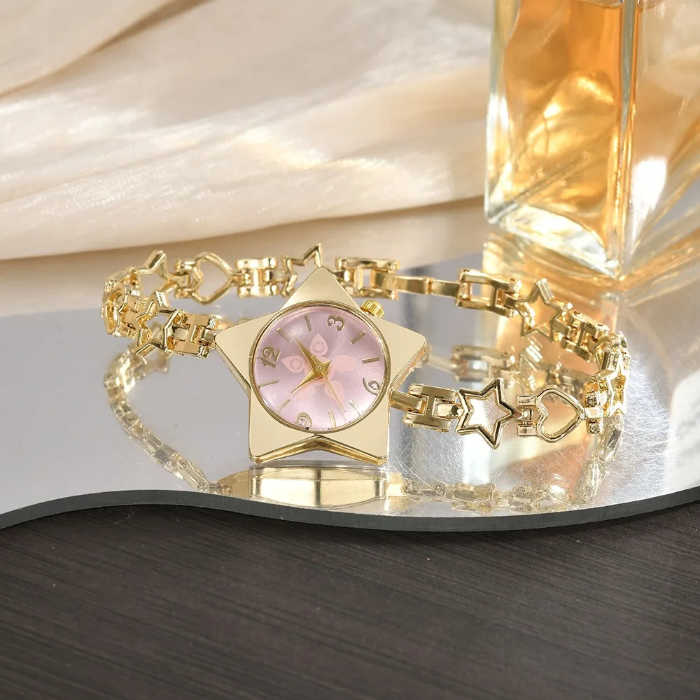

Новые женские часы из сплава с кварцевым механизмом, креативный дизайн, элегантные роскошные часы-браслет со звездами для праздничных случаев