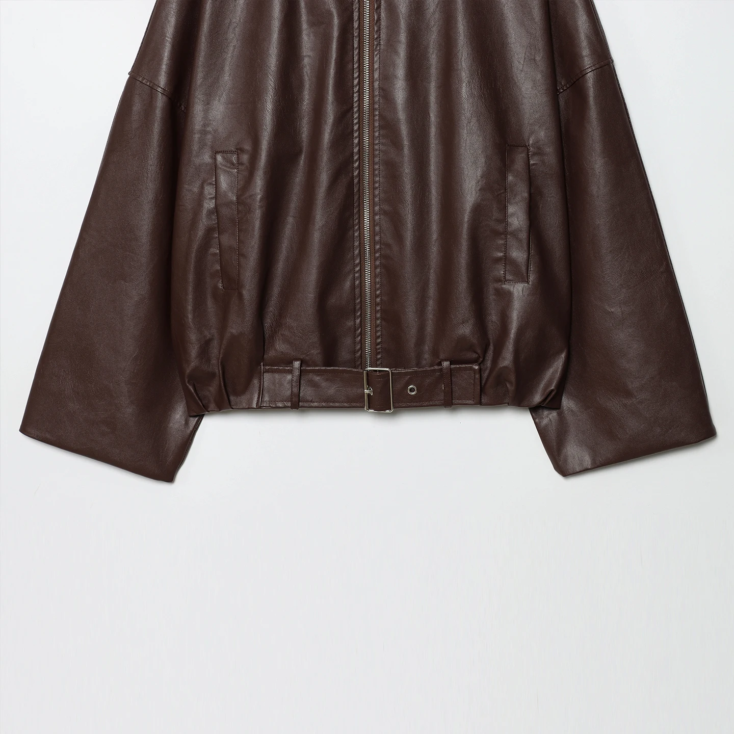 ファッショナブルなレザージャケットコート ポケットとベルト付き レディース 秋の新作 個性的なデザイン 通勤スタイル ルーズフィット 長袖 ジッパー開閉 ショート丈