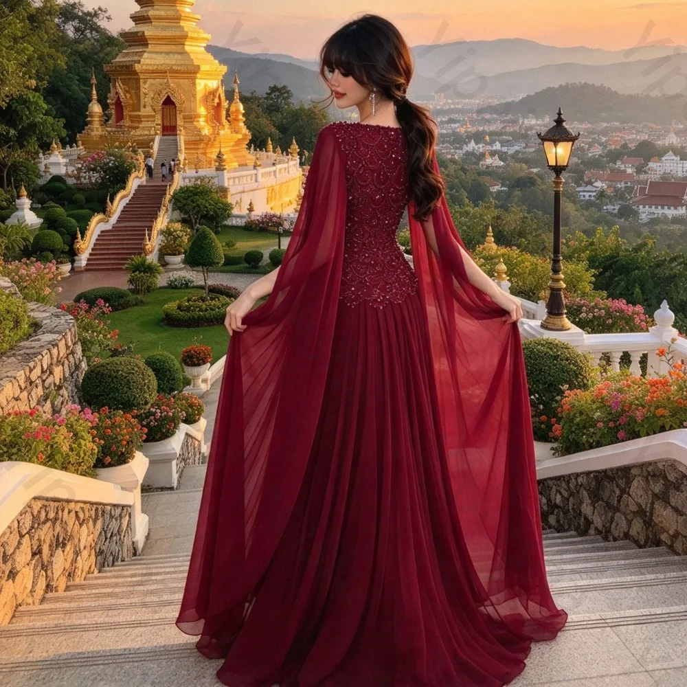 Customized Cape Burgundy Floor Length Evening Dress 2026 Beaded A-line Transparent Long Sleeved Ball Gown Suitable for Banquets