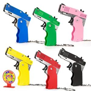 Pistol Karet Gelang Gantungan Kunci Pistol Mainan Lipat Paduan Mini Menembak Cepat Pistol Mainan 6 Karet Dilengkapi dengan Karet Gelang 6 senjata mini penjualan terbaik - №