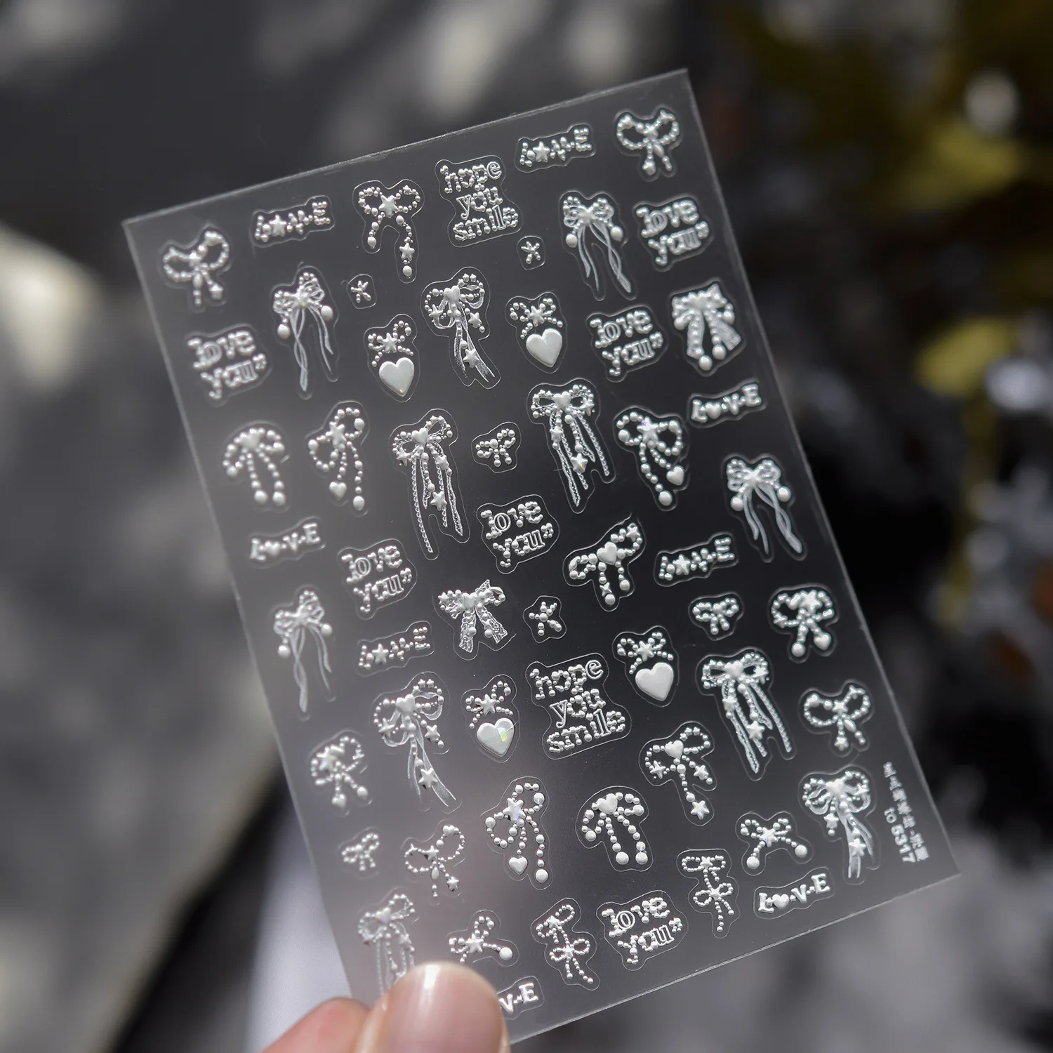 夢のような星の光で飾られた蝶結びのラブハートネイルステッカー高品質文学と芸術デザインアートデコレーション T-5317