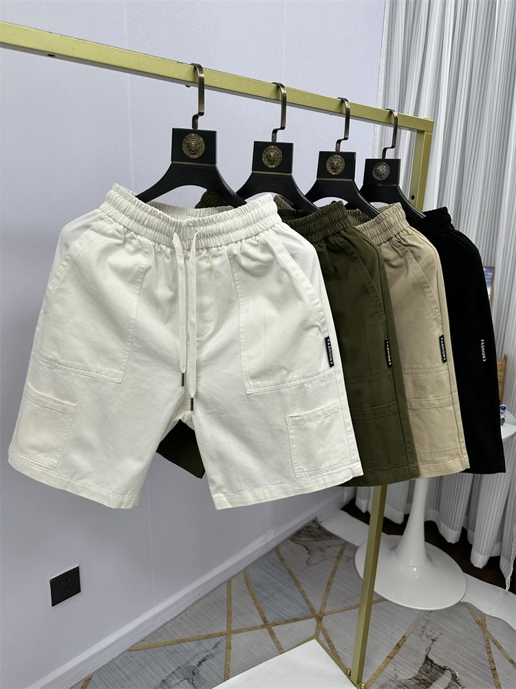 

Casual Youthful Men's ort Pants Elastic Waist Five-Quarter Length Multiple kets Workwear Sle Summer New Trend