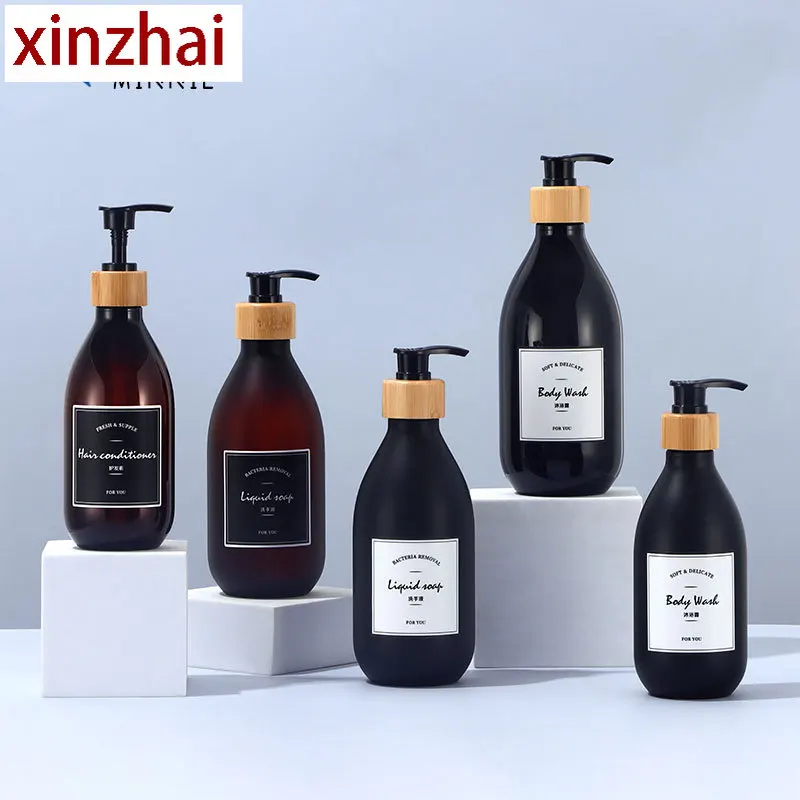 Black high-value 500ml hand sanitizer bottle light luxury bamboo and wood pump head pressing lotion bottle shampoo bottle