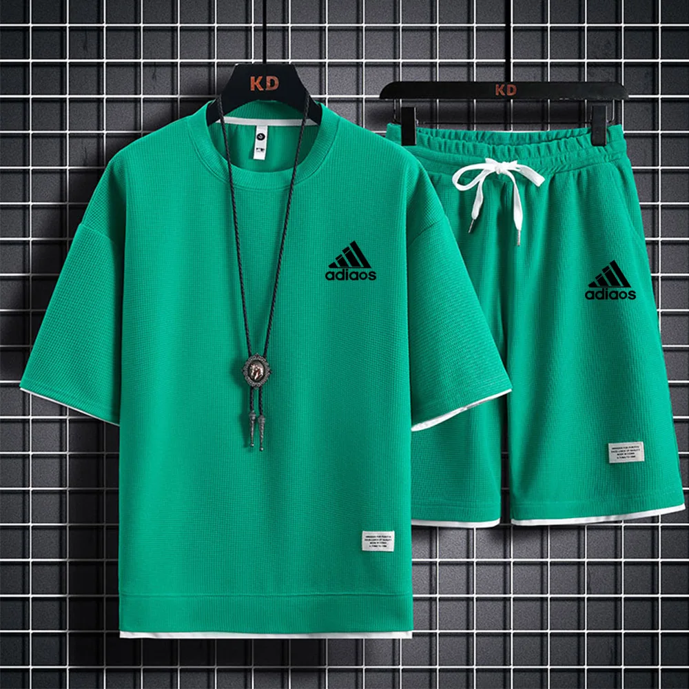 2025 ใหม่ชายฟิตเนสแฟชั่นชุดผู้ชายชุดกีฬาสบายๆชุดกีฬาแห้งเร็วเสื้อยืดแขนสั้น + กางเกงขาสั้น 2 ชิ้นชุด