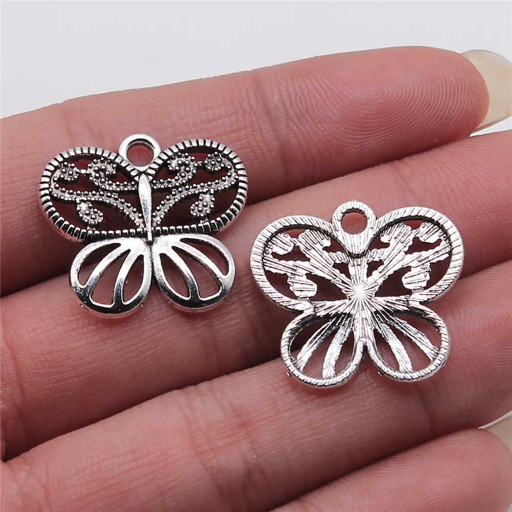 

WYSIWYG 10pcs 21x24mm Hollow Butterfly Pendant Charms Antique Silver Plated For Jewelry Making Jewelry Findings