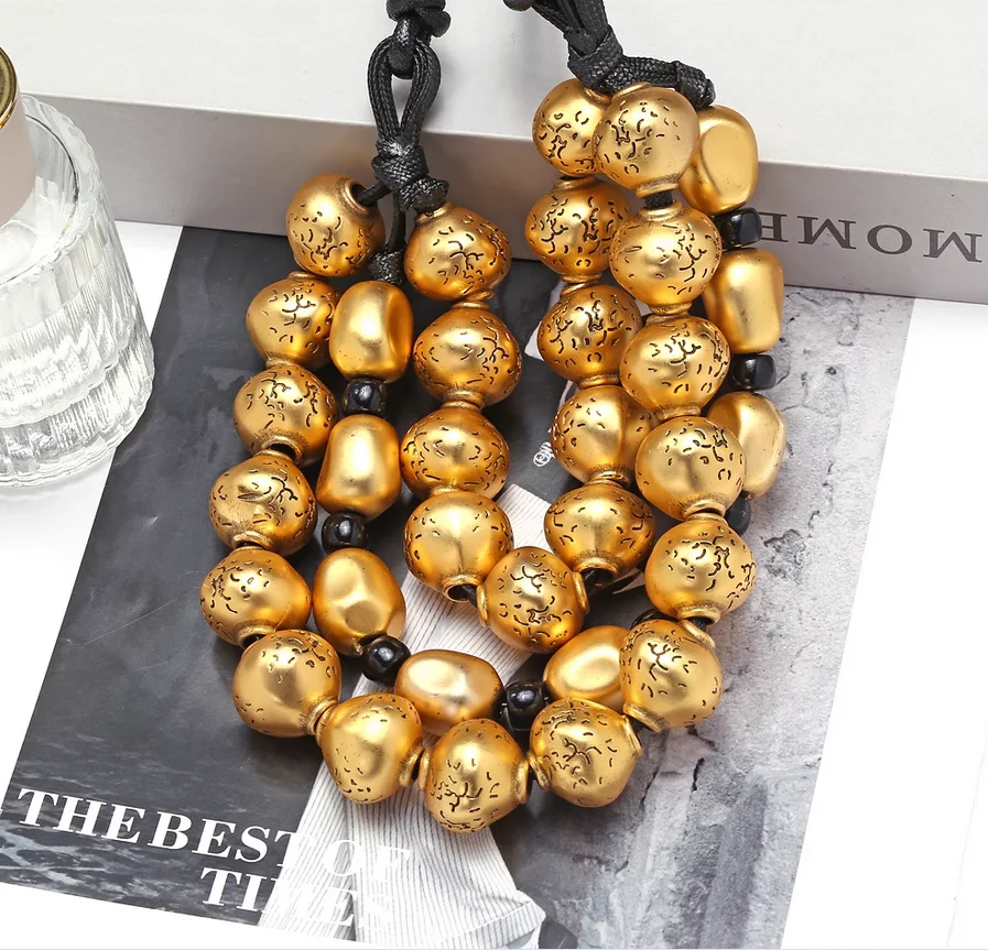 Europe and the United States big-name design sense niche metal retro spherical multi-layer beading