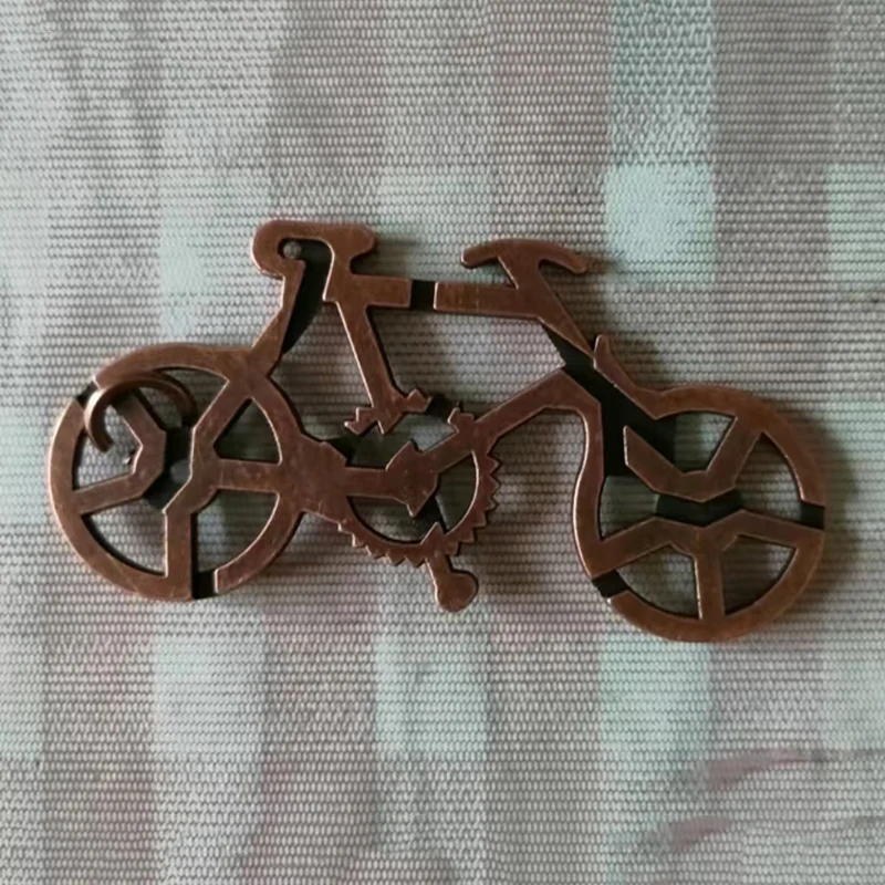 Bicicletta Puzzle in metallo Rompicapo Test IQ Giocattoli Giochi mentali educativi Disentanglement Trucco magico Regali novità per bambini Adulti