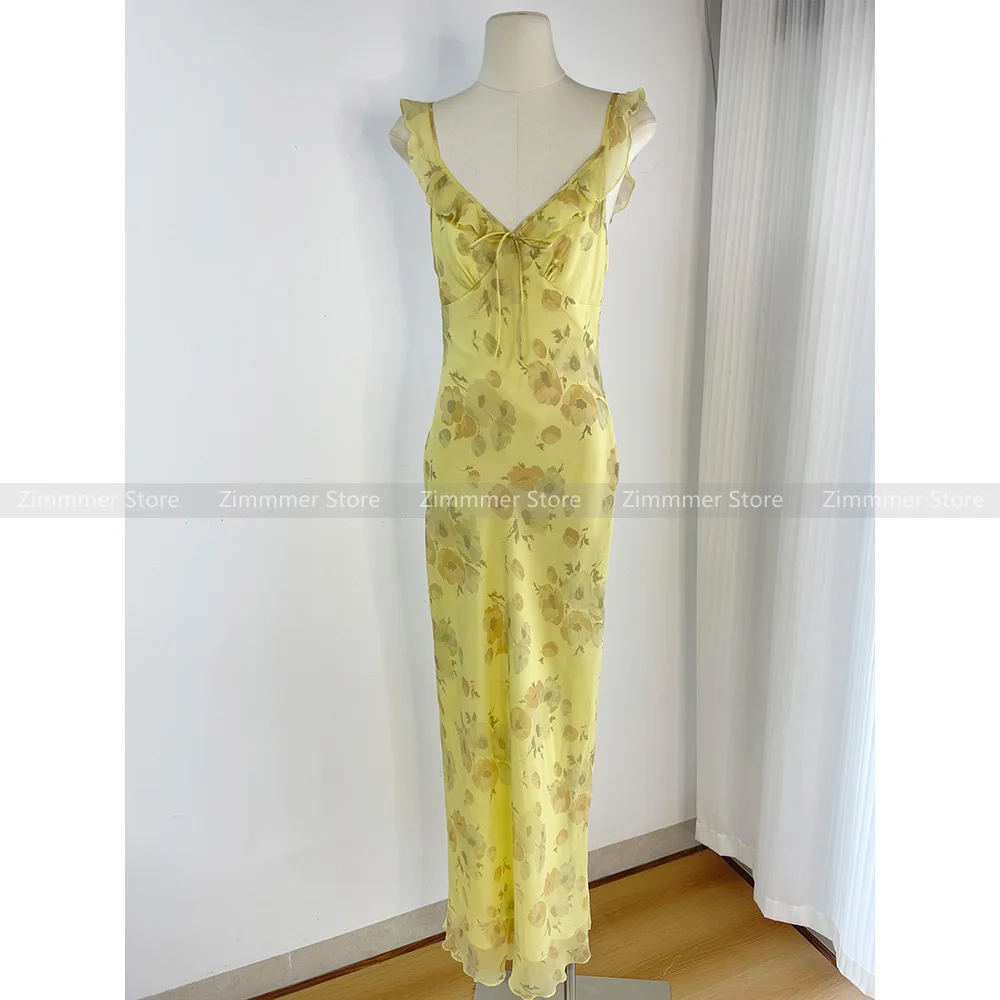 V-neck ruffled yellow floral halter dress women 2024 summer French temperament waist thin seaside long skirt