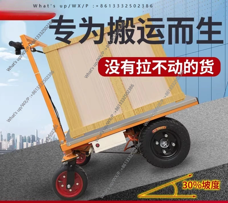 Electric flatbed truck truck construction site pulling bricks and goods