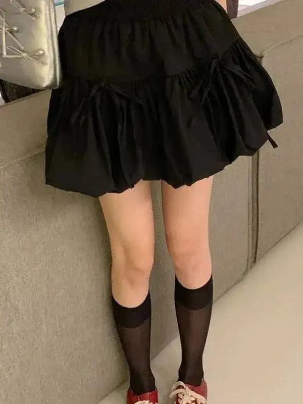 Coréen nœud papillon une ligne jupes femmes été taille haute lanterne Mini jupes femme couleur unie Style doux jupe filles LYS9