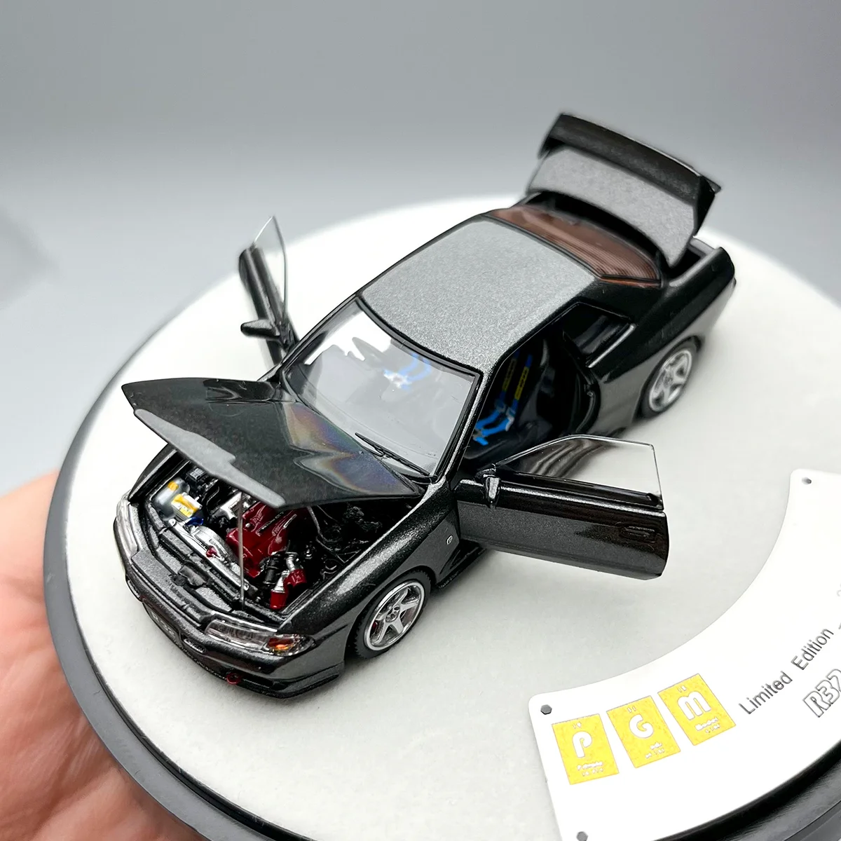 

PGM 1:64 Compact R32 Diecast Model Car
