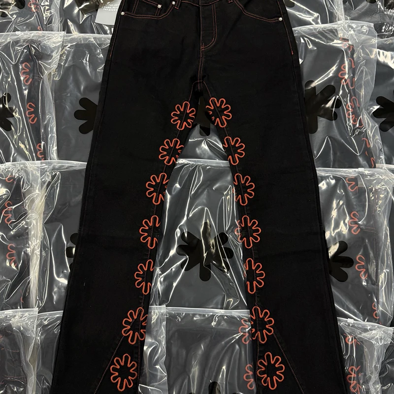 LOSTSHDWS jean tournesol détaillé ajouré broderie américaine haute rue Patchwork jambe droite Streetwear