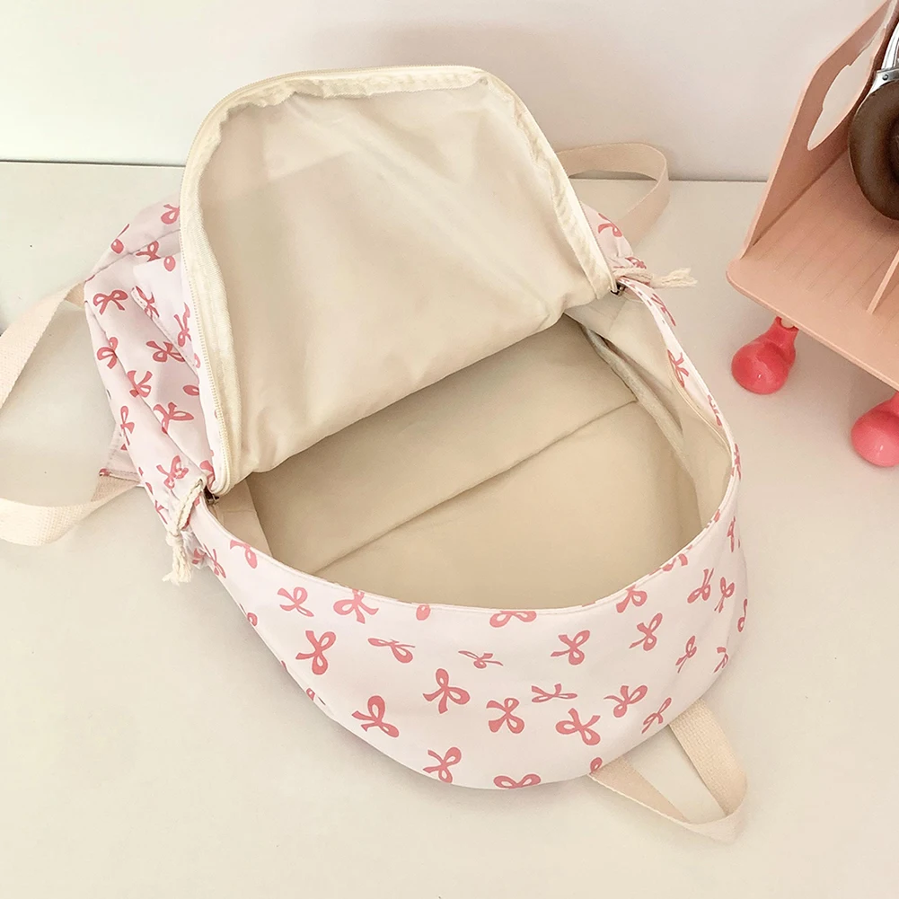 حقيبة ظهر مدرسية مطبوعة على شكل فيونكة حقيبة ظهر جامعية Preppy حقيبة مدرسية متوسطة للفتيات المراهقات