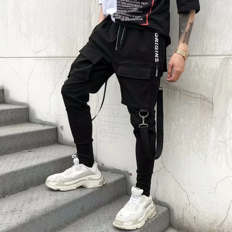 Pantalones ajustados de moda para hombre, ropa de calle con cinta Harajuku, pantalones Cargo negros para hombre, ropa informal para correr, pantalones Kpop de Japón