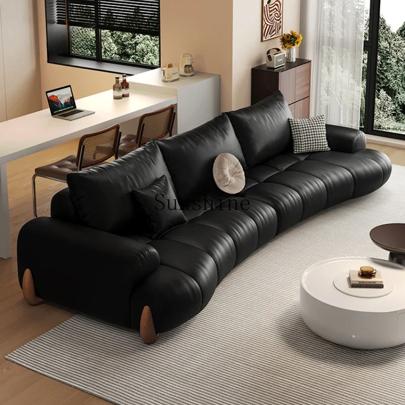 

Living room puff Italian minimalist small apartment first layer cowhide curved sofa