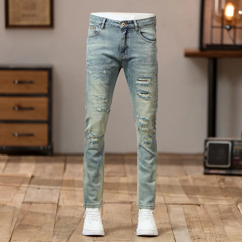 جينز لخريف 2025 باللون الأزرق الفاتح المتعثر للرجال على الطراز الأمريكي عصري بقصة ضيقة على طراز الشارع سروال ماركة رائع
