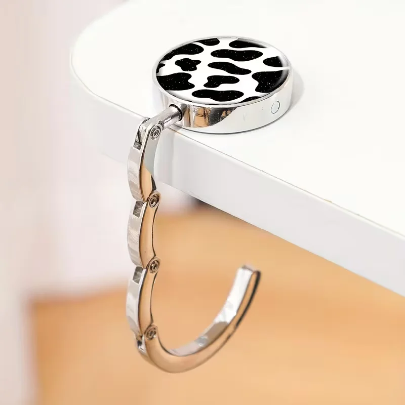 Zinklegierungs-Geldbörsenhalter, lässiger, faltbarer Handtaschenhalter, tragbarer Tisch-Taschenhalter – Detail 5