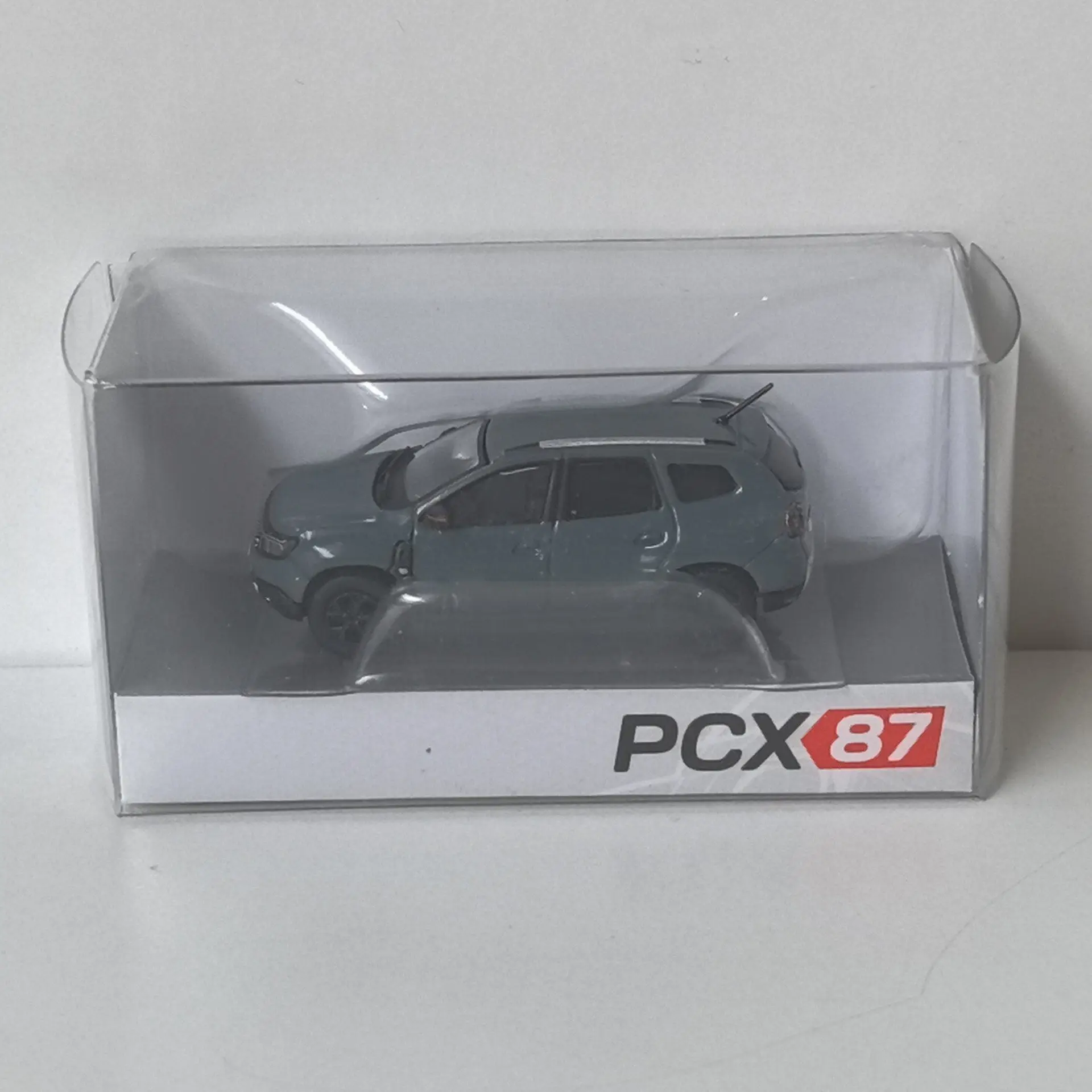 

Модель автомобиля PCX HO 1/87 Duster II из пластика