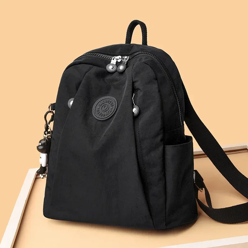 

2025 New Waterproof Nylon Cloth Women Backpack Fashion School Bags for Teenage Girls High Quality Shoulder Bag Travel Back Pack