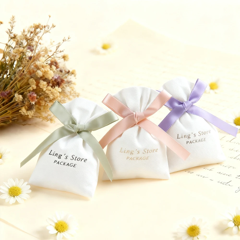 

100 шт., белая муслиновая сумка с логотипом для ювелирных изделий, хлопковая парусиновая подарочная упаковка, сумка с лентой для хранения кристаллов для детского душа