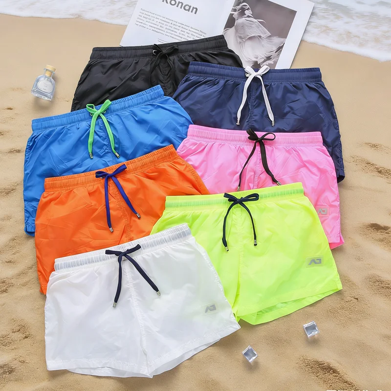 2026Beach new quick-drying men's and women's shorts breathable casual beach sports loose couple swimming trunks tide AD4-M356