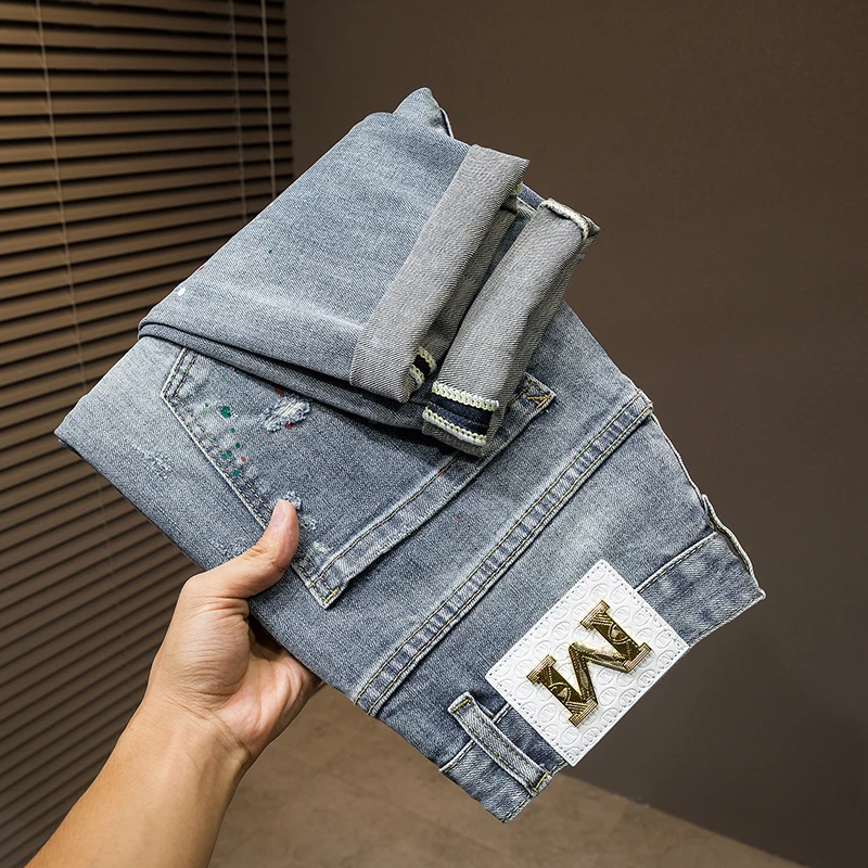 

New Light Luxury Men'S Jeans Fashion Hole Patches Tide Elastic Slim Embroidery Spray Paint Personality Street Casual Denim Pants