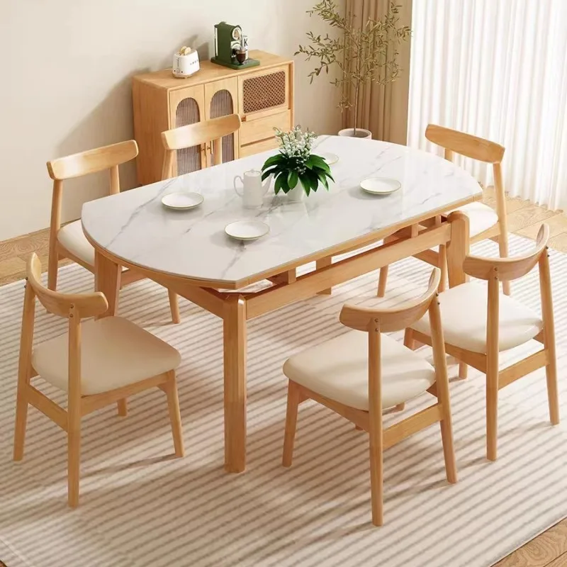 

Nordic solid wood jumping platform rock slab dining table and chair combination modern simple household small apartment