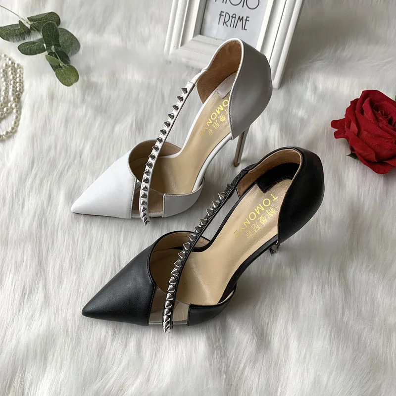 

Black and white matte sheepskin pointed rivets one-word diagonal tape film splicing hollow 12cm commuter etiquette high heels