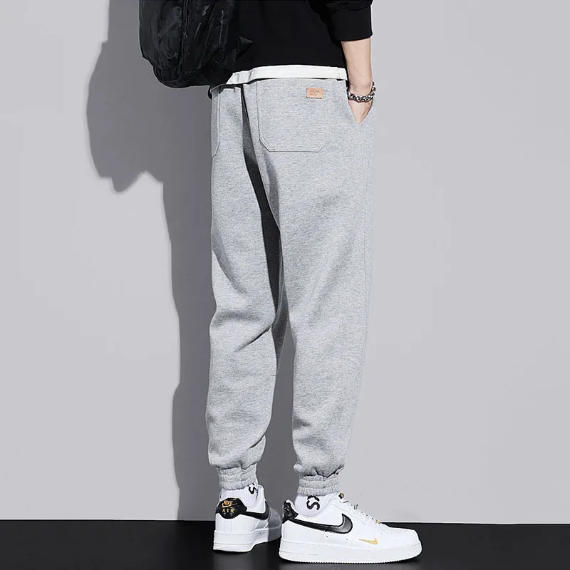 Casual Sweatpants Men Young Style Autumn Winter Plus Fleece Motion Solid Color Loose Bright Line Decoration High Street Trousers