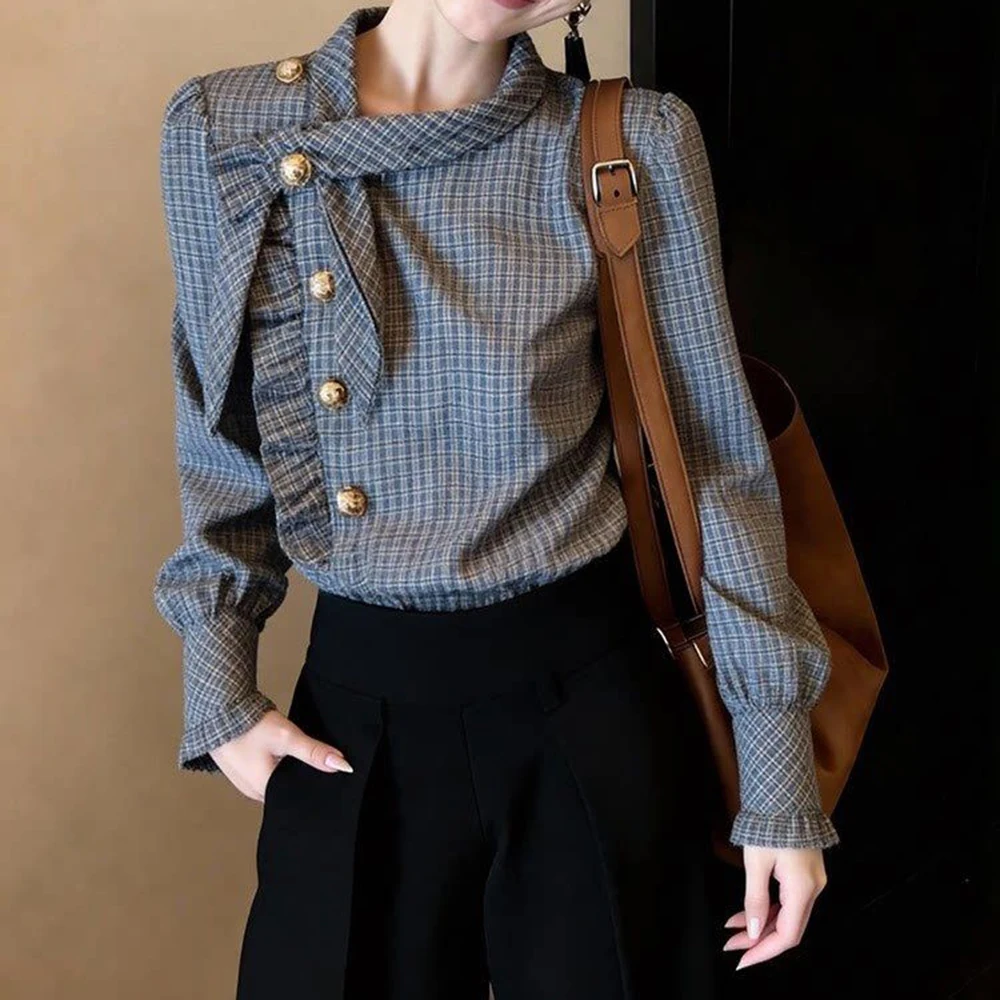 

Design sense Korean new daily commuting casual plaid shirt women's 2026 spring thin side button narrow sleeve cardigan