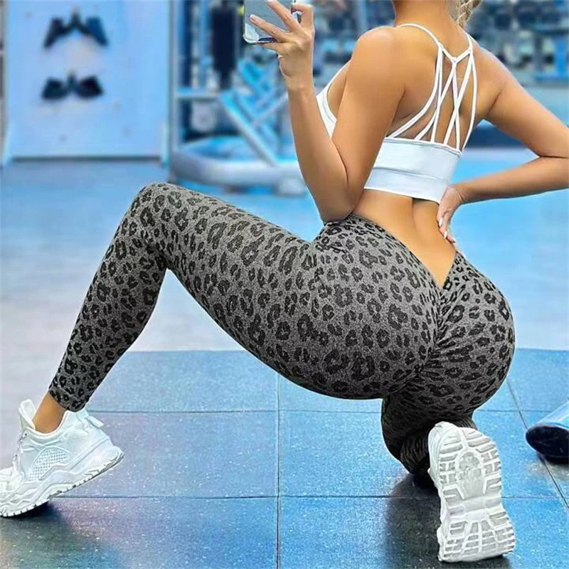 Leggings da allenamento per donna pantaloni da Yoga senza cuciture a vita alta con controllo della pancia e stampa leopardata con schiena a V