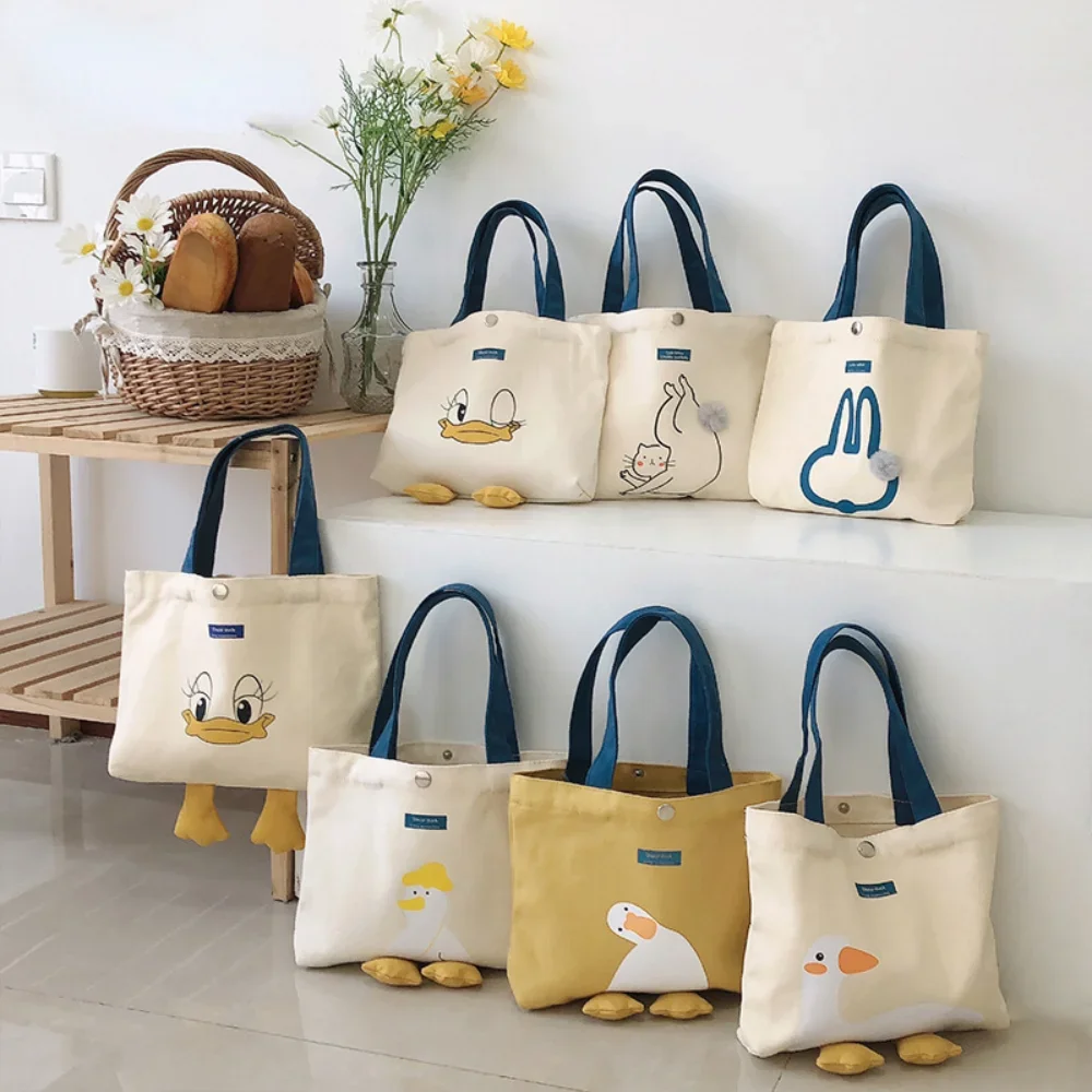 Bolso de mano delicado que combina con todo para mujer, bolsas de pato amarillo, compras de lona casuales con bolsa de almuerzo Simple, dulces para