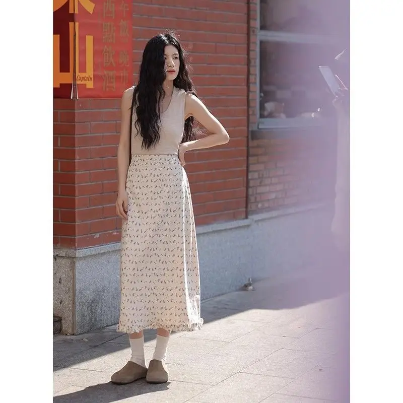 Zoete en frisse bloemenrok Dames zomer 2025, hoge taille temperament split lange rok