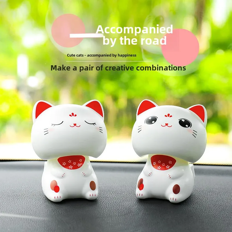 

Solar nod Zhaocao car ornaments car interior accessories center console ornaments shaking head supplies