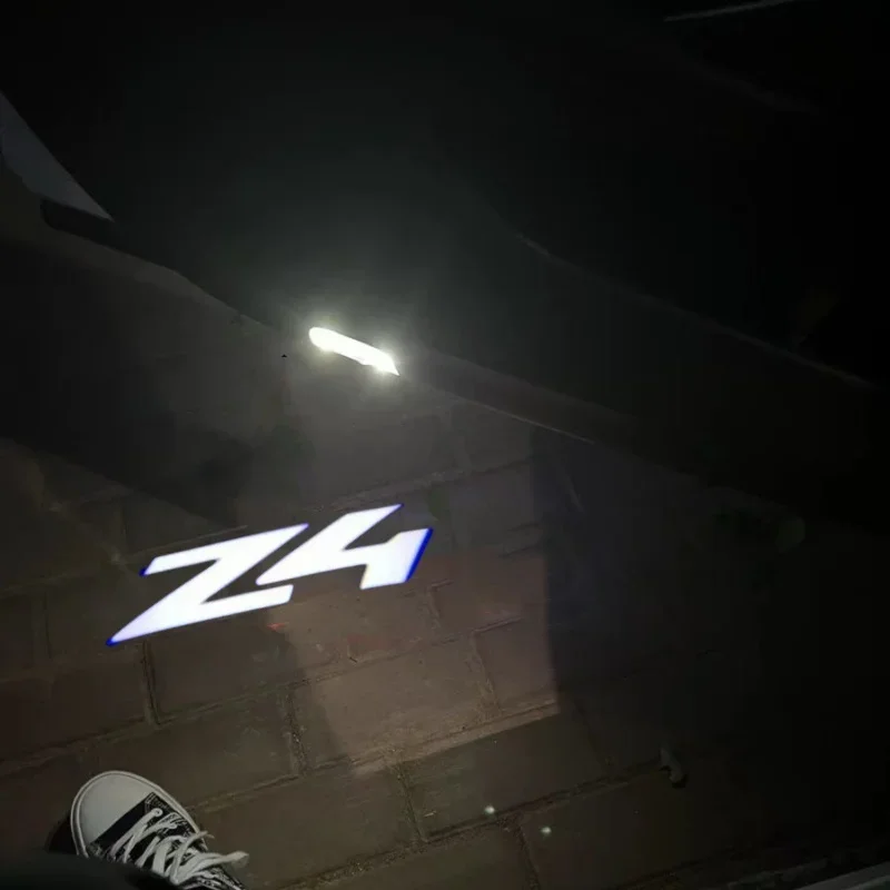 

2Pcs LED Car Door Welcome Lights Projector Courtesy Lamp for BMW Z4 Series X1 X3 X4 X6 E91 I3 I4 F30 F48 F30 F10 E30 E34 FO2